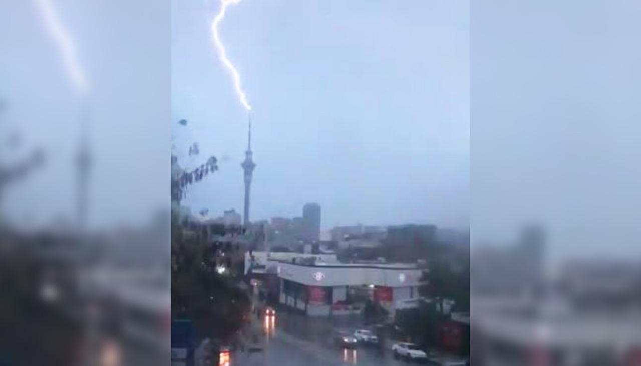 Watch: Lightning strikes Auckland's Sky Tower | Newshub