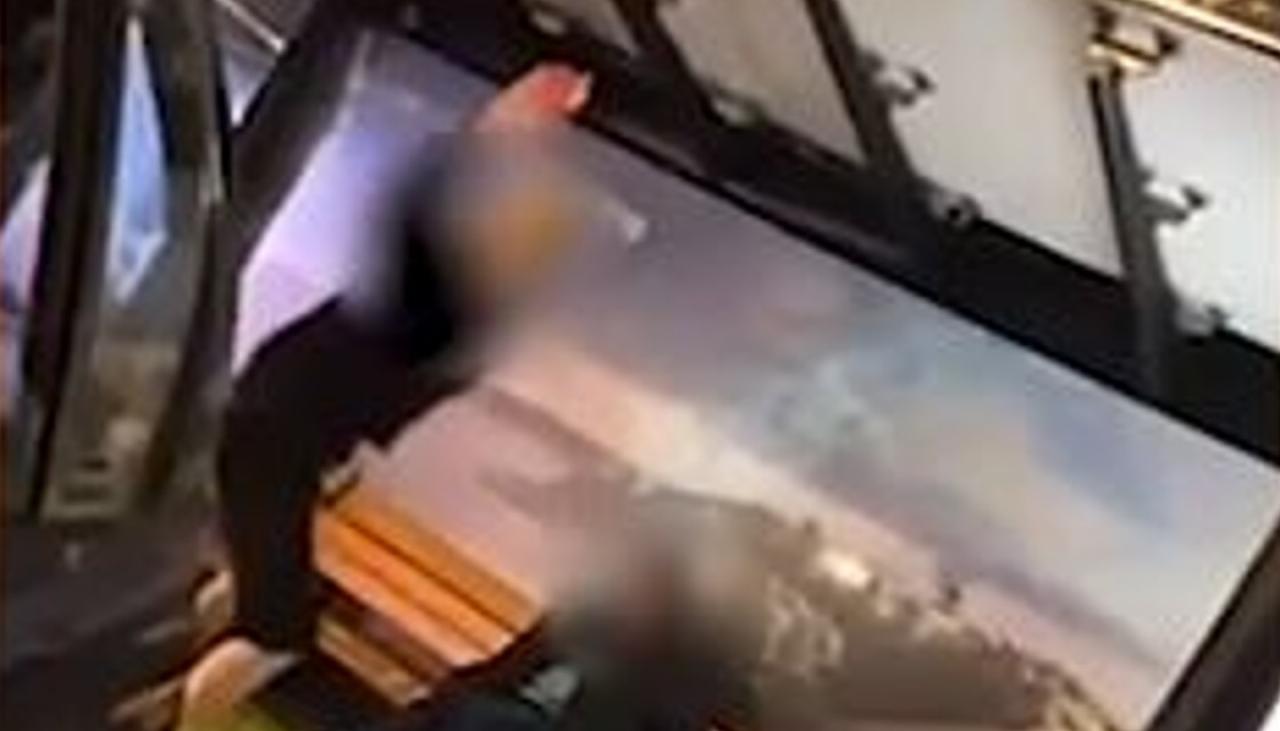 Kiwis 'disgusted' by 'horrid' video of people throwing food at homeless person in Auckland