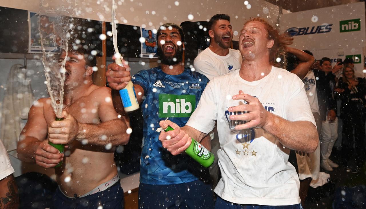Super Rugby Trans-Tasman: Behind the scenes - Blues players celebrate in changing room after title win | Newshub