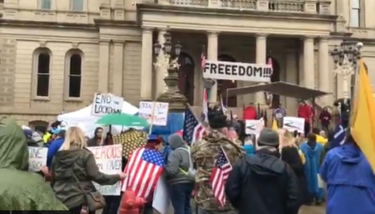 Armed protesters storm Capitol building in Michigan | Newshub